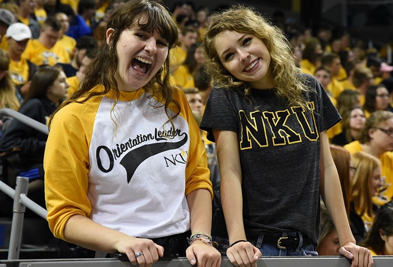 Two NKU students celebrating at an NKU rally